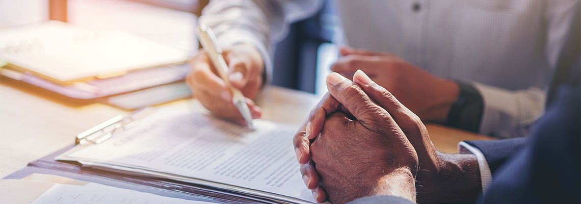 Man reading document before signing NDA