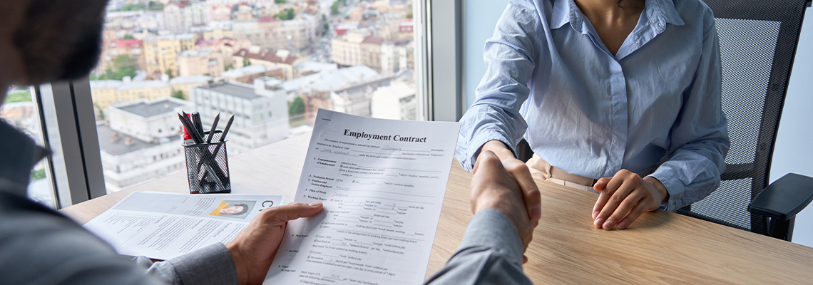 CEO holding employment contract job offer hiring welcoming female