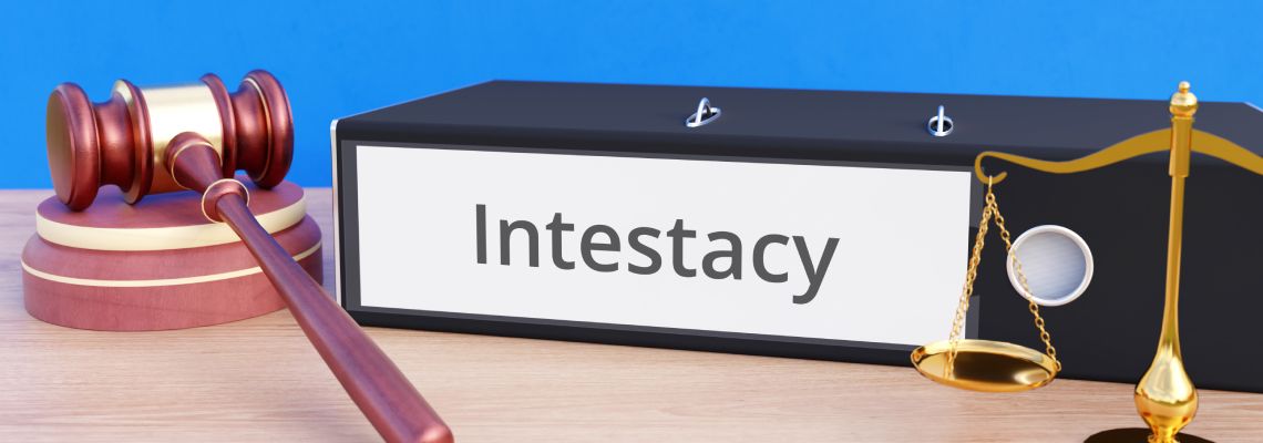 Intestacy file folder with gavel and scale of justice