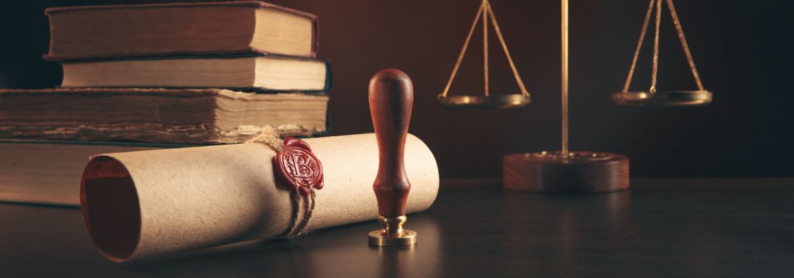 Last will document with notary stamp and scale of justice