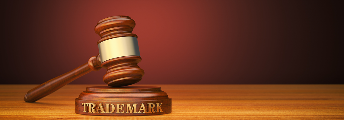 Trademark law with wooden gavel on a table