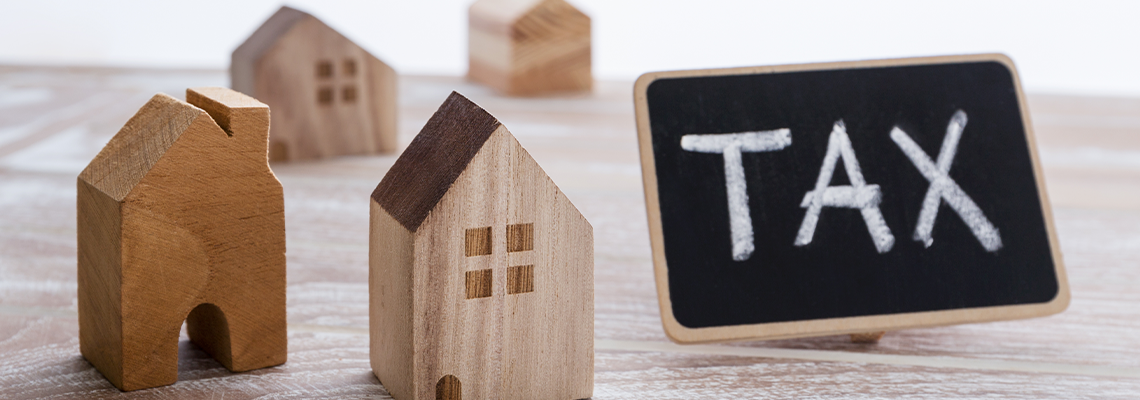 Houses with tax sign
