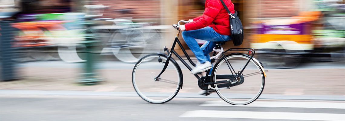 bicycle rider in the city in motion blur