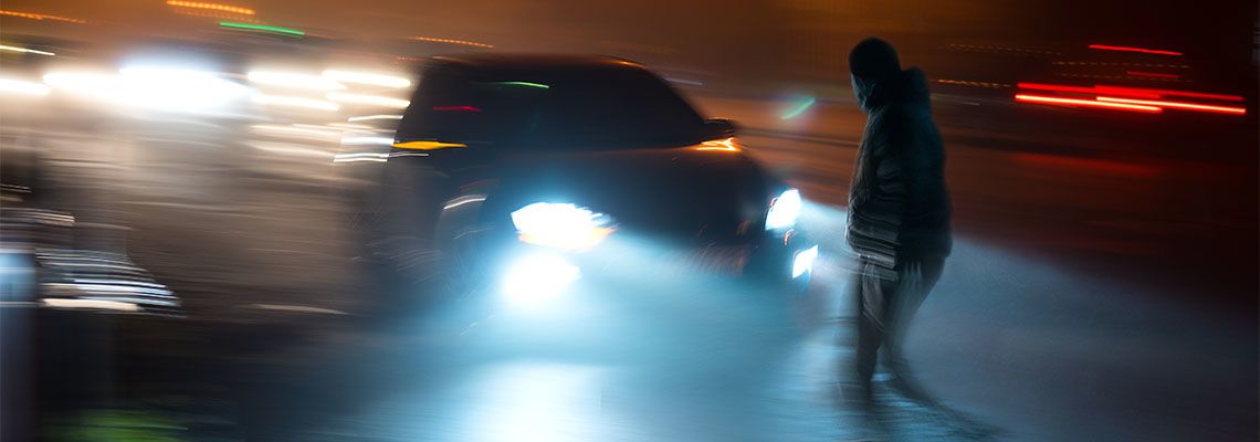 Car about to hit pedestrian in crossing