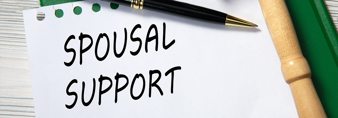 SPOUSAL SUPPORT - words in white paper against the background