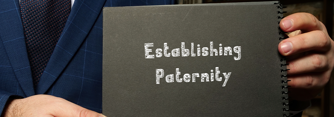 Juridical concept about Establishing Paternity with inscription on the sheet