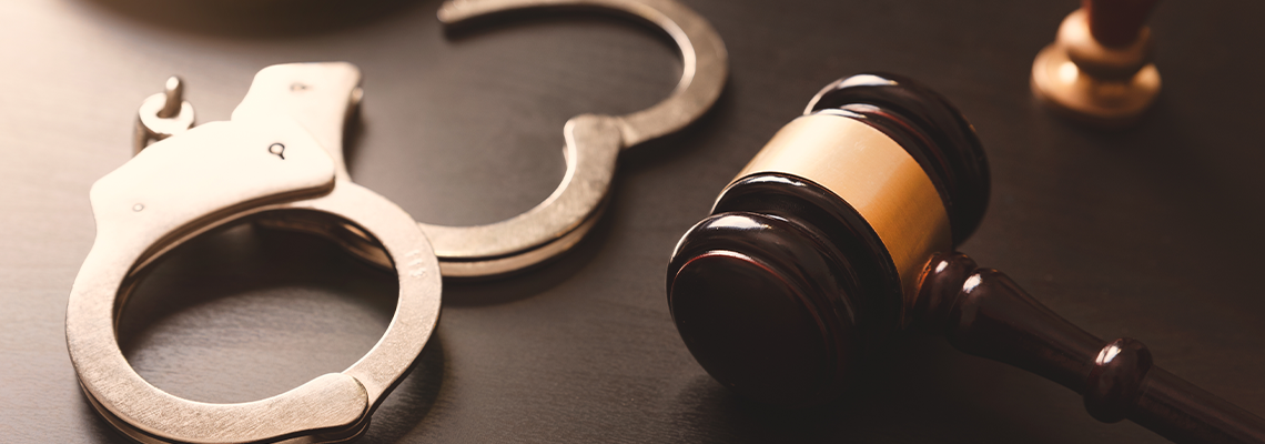Crime and violence concept with handcuffs