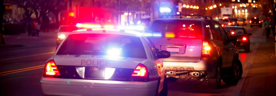 Police pulls over a car