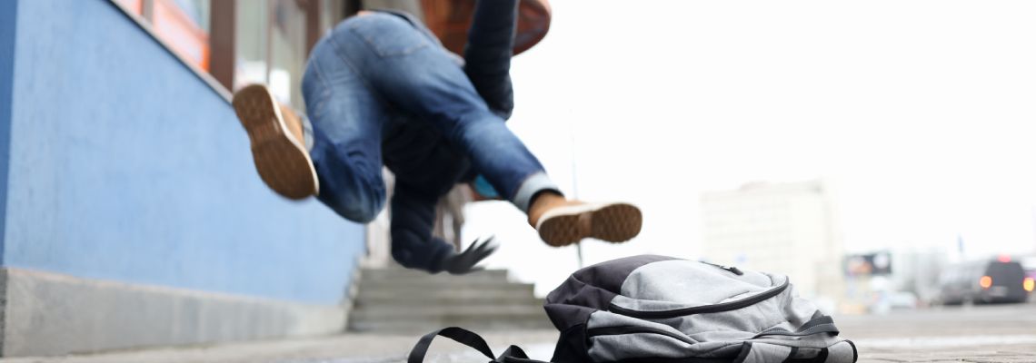 Man Slips in an icy pavement