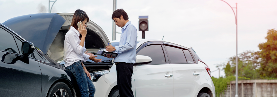 Woman Driver Calls for Instruction During Insurance Agent Review