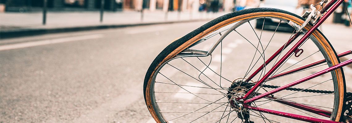 Damaged wheel of bicycle after accident
