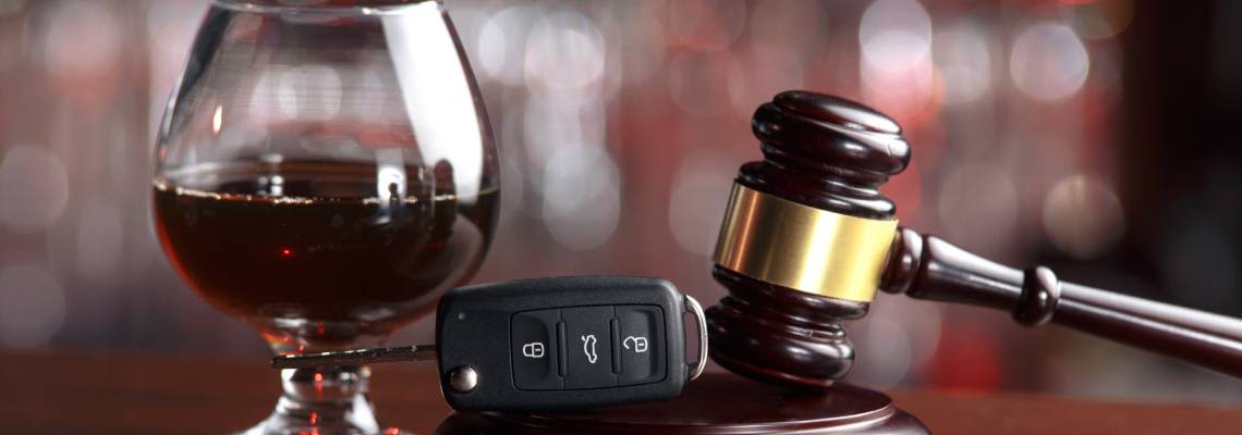 Glass of Alcohol, Car Keys and Gavel
