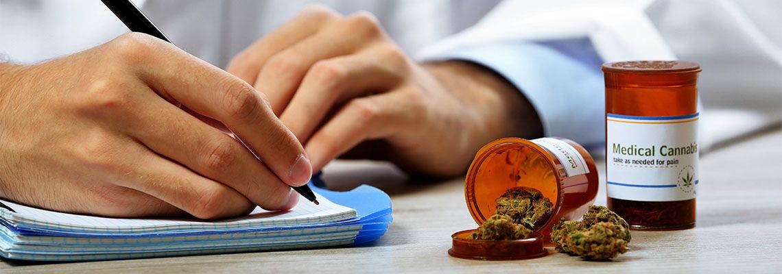 Doctor writing prescription for medical marijuana