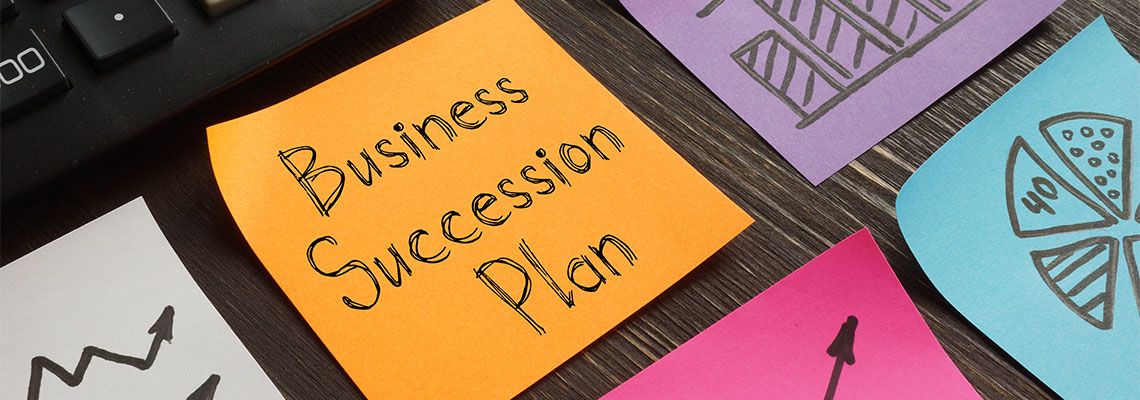 Business Succession Plan is shown on a sticky note