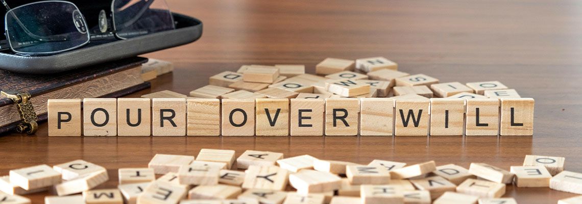 Pour over will word represented by wooden letter tiles