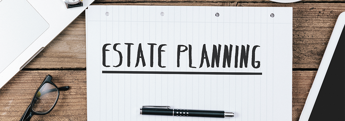 Estate Planning Text on Note with Pen