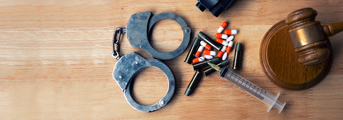 Bullet with a hammer of the judge and gavel on table