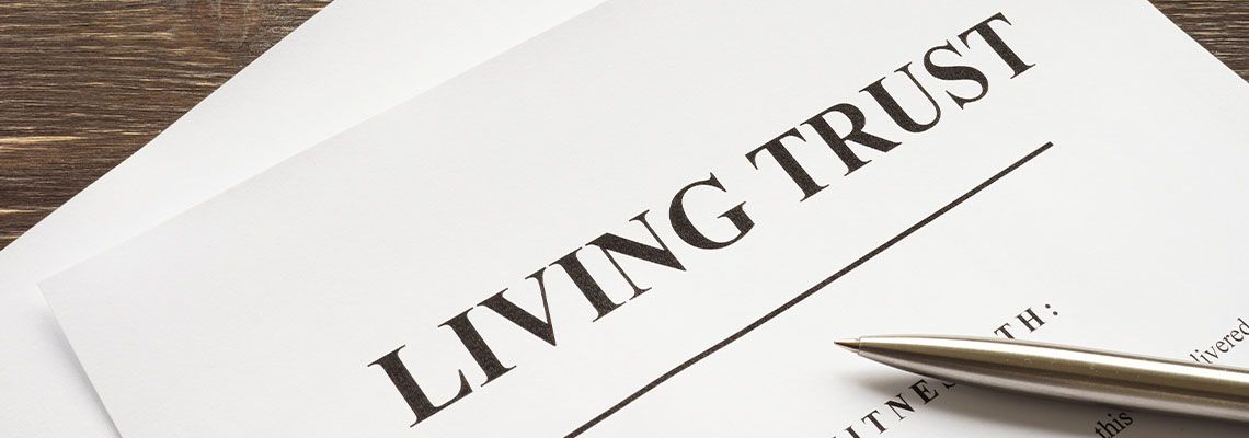 Living Trust file with pen