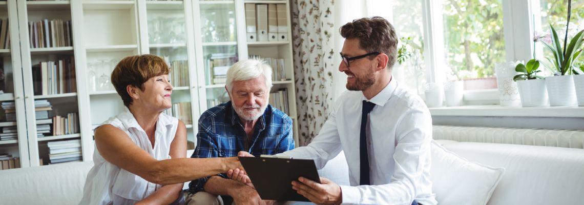 Old couples consulting with attorney for estate planning