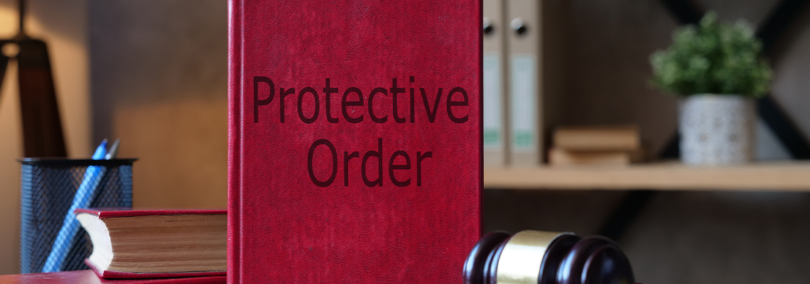 Protective Order is shown on the photo using the text