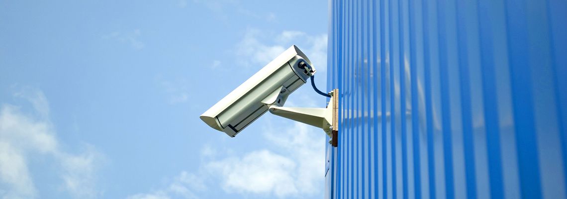 Outdoor security camera on the side of a building