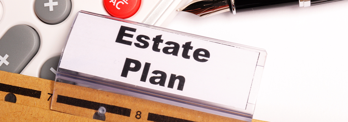 Estate Plan on Paper with Pen and Calculator