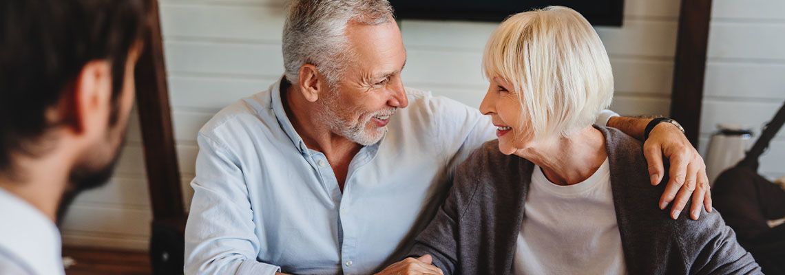 Senior couples preparing estate plan with help of attorney