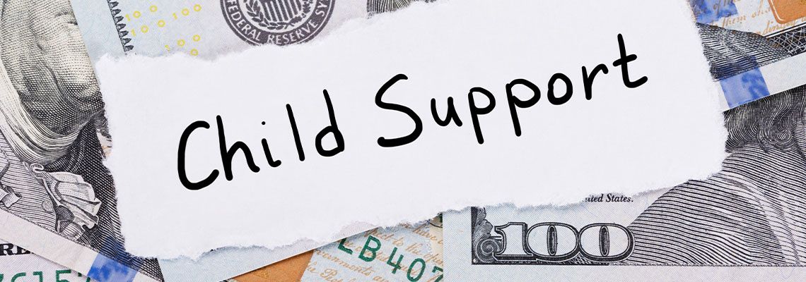 Child Support Note Placed On Top Of Dollar
