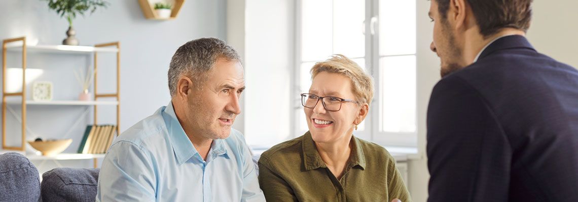 Senior couples consulting with attorney to discuss estate plan options
