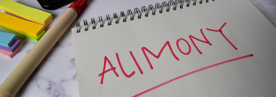 Alimony write on a book and keyword isolated on Office Desk