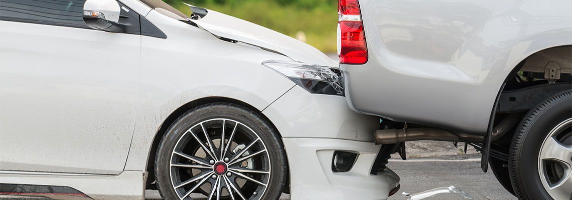 Car accident involving two cars on the street