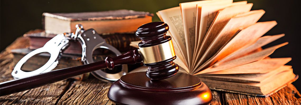 Judge hammer, Handcuff and Book