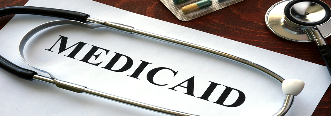 Paper with Medicaid and Stethoscope.