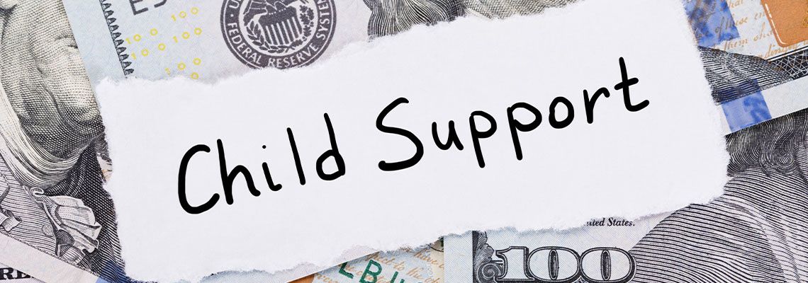 Child Support Note Placed On Top Of Dollar