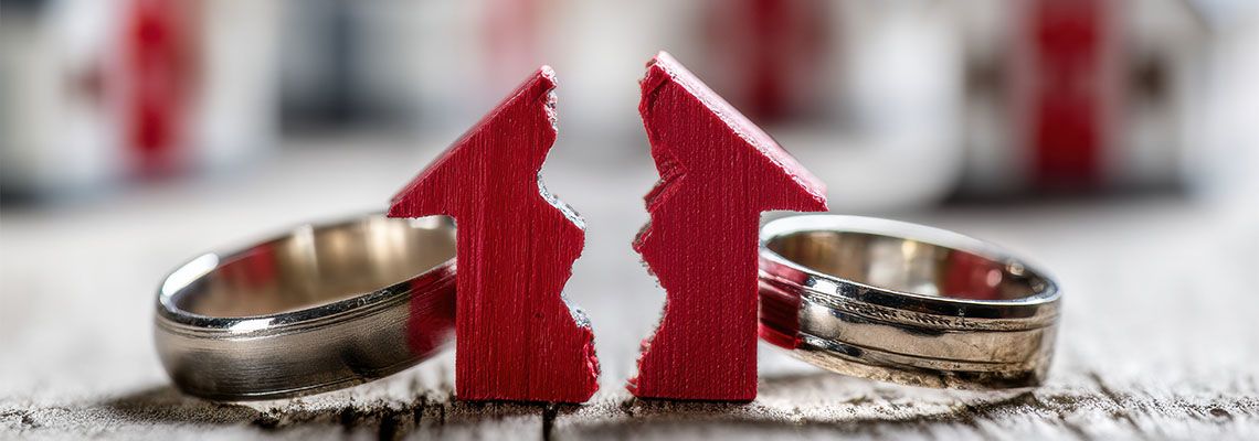 Divided house model and wedding ring