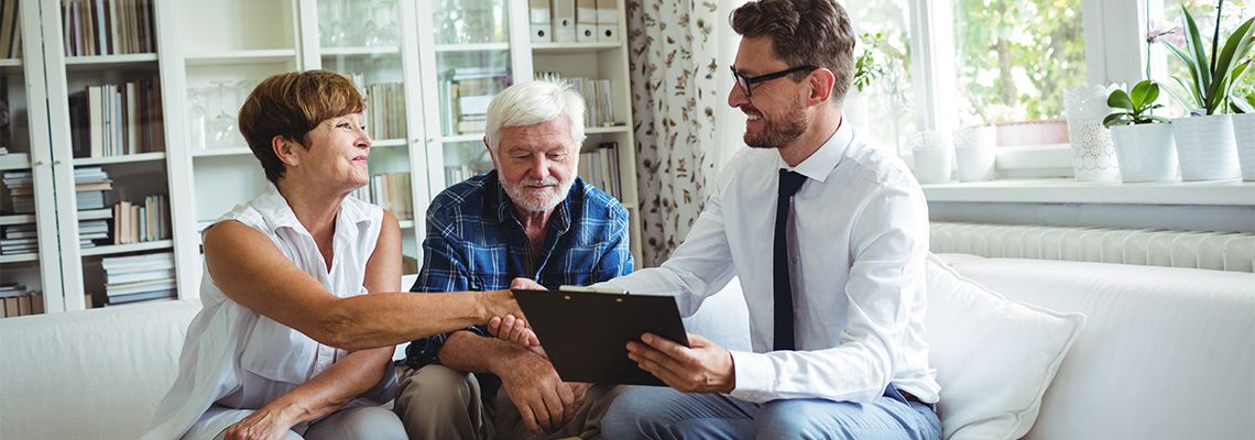 Old Couple preparing estate plan with attorney