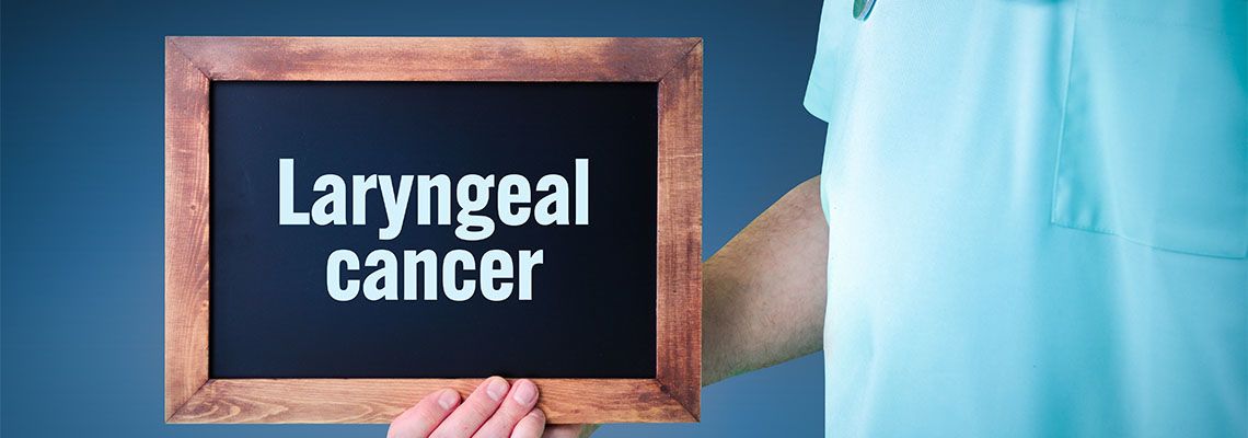 Doctor shows board with letters Laryngeal Cancer