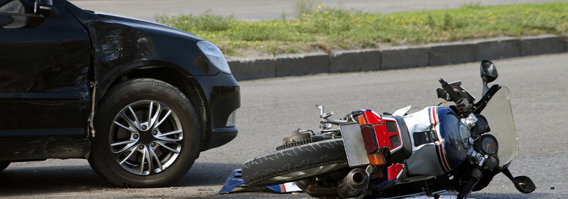 Crash Motorbike and Car on Road