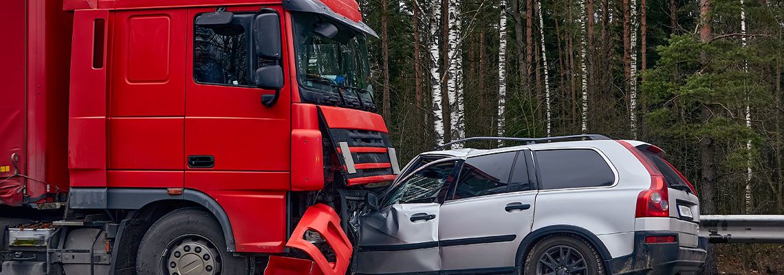 Collision between Truck and Car in road