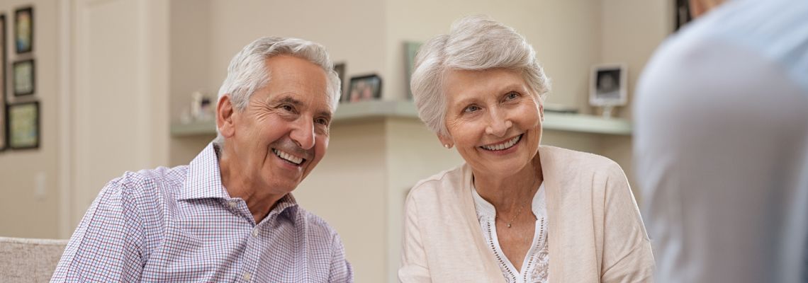 Couples discussing estate plan with professional