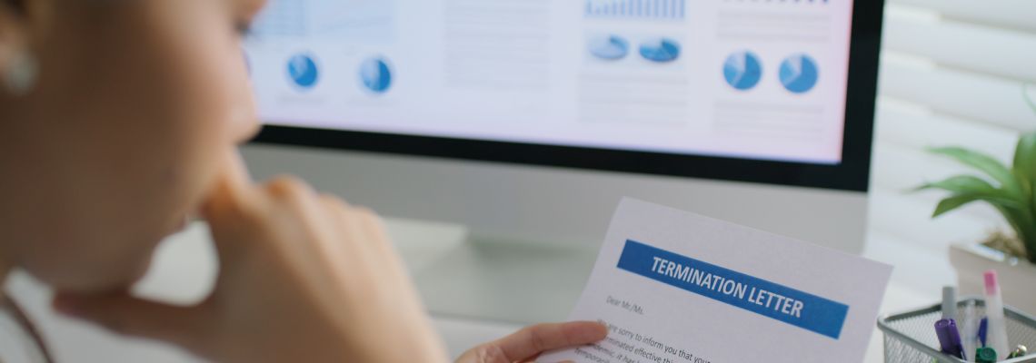 Young women reading termination letter
