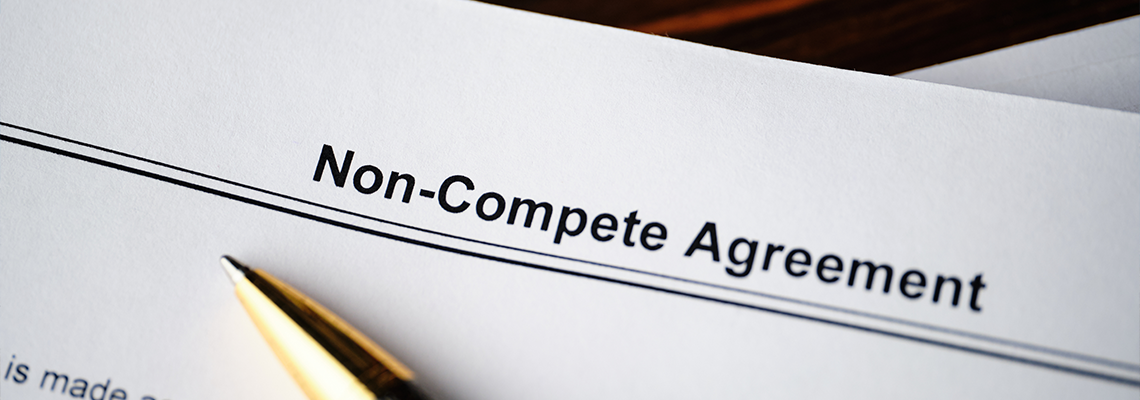 Legal document Non-Compete Agreement on paper close up