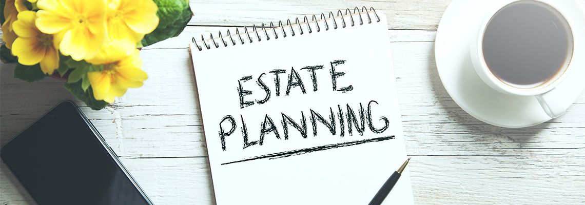 Estate planning text on notepad