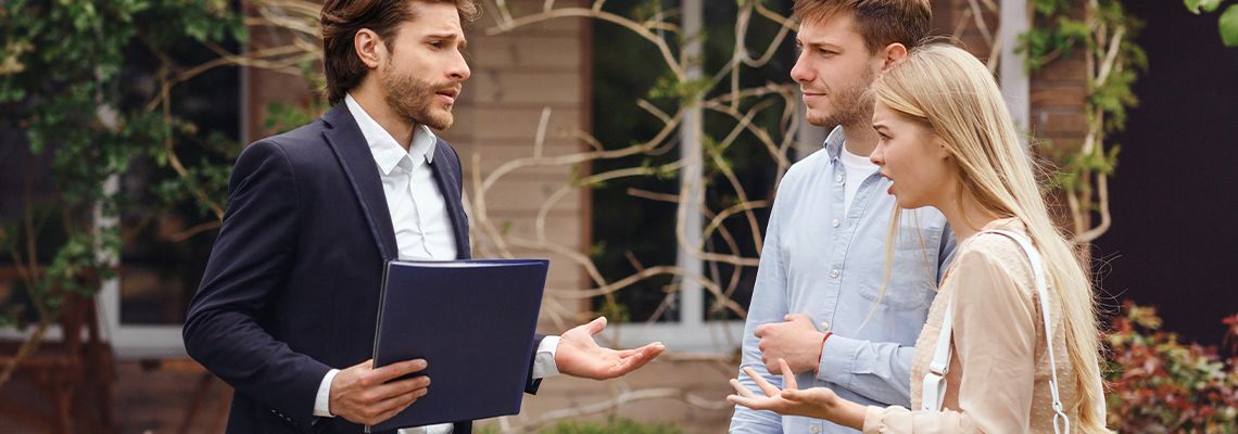 Unhappy customers arguing with property manager
