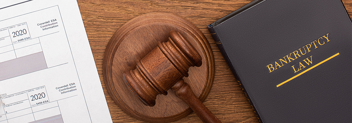 Book titled Bankruptcy Law and gavel on desk