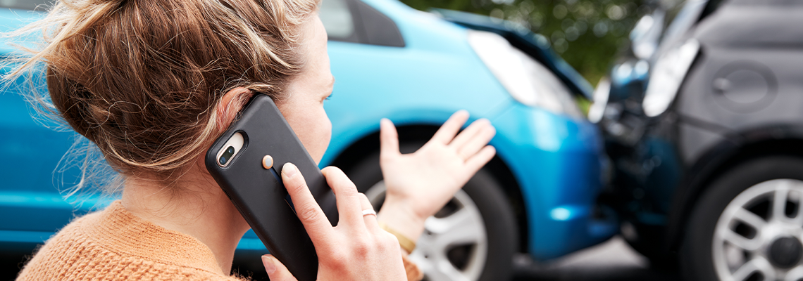 Motorist Involved in Car Accident Calling Insurance Company