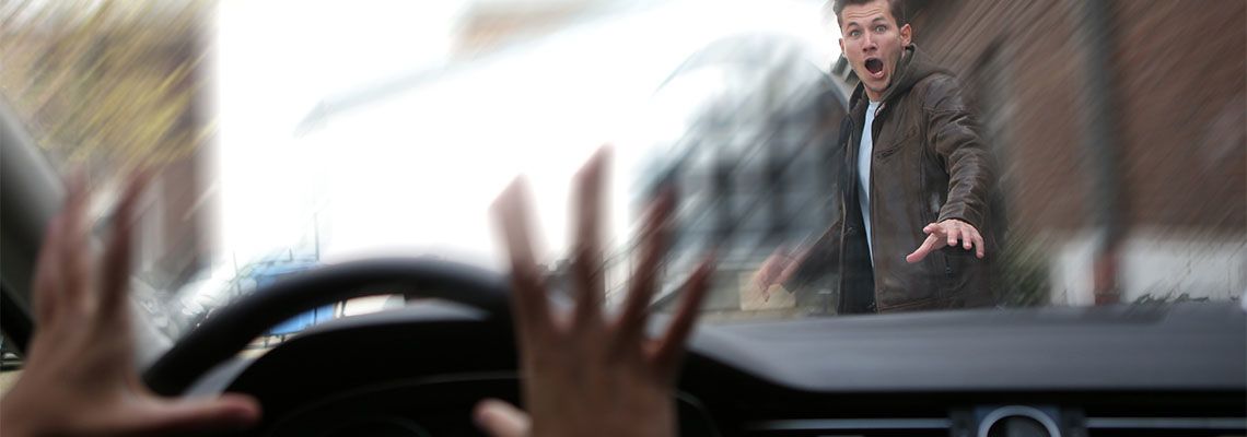 Speeding car about to hit pedestrian