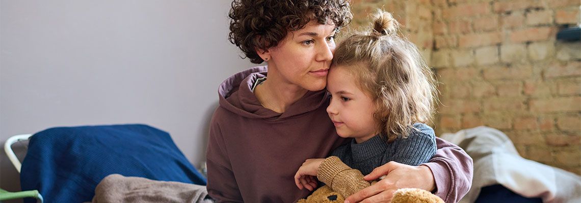 Mother hugging her little boy