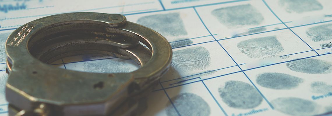 Handcuffs and fingerprint record sheet