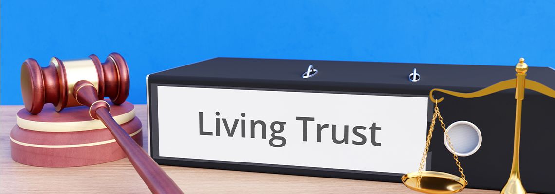 Living Trust file folder with gavel and scale of justice